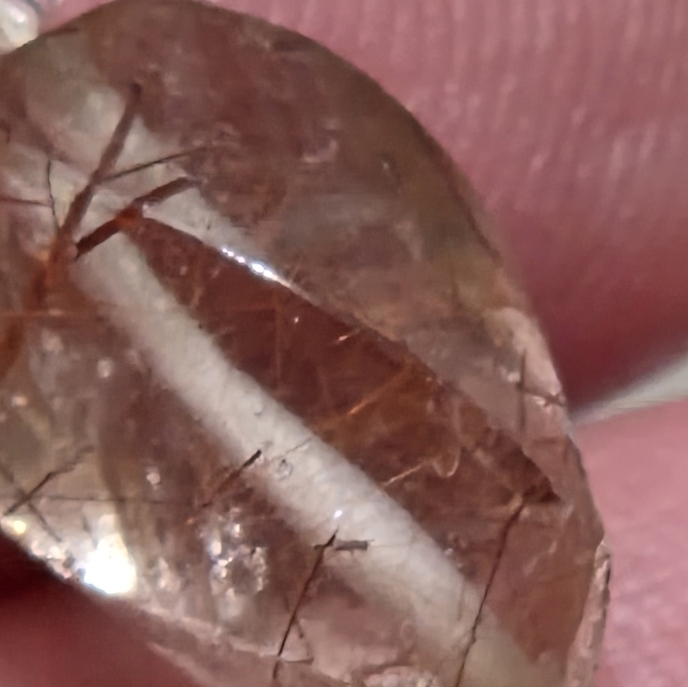 Rutilated quartz, hair-like quartz,  with phantom inclusions with a braselet